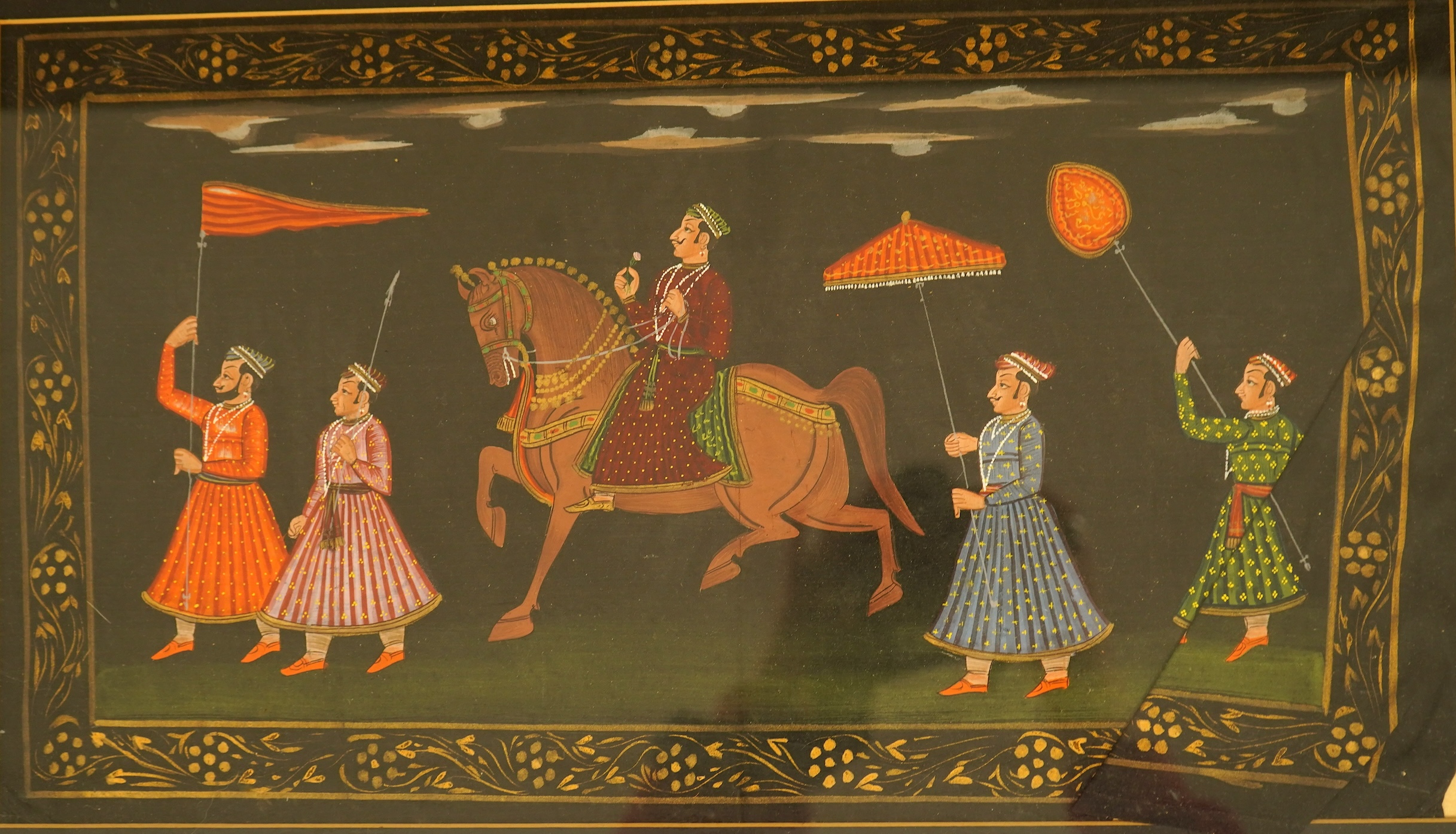 Indian Mughal style, Procession of figures, watercolour on fabric and a similar smaller work with calligraphy, largest 24 x 43cm